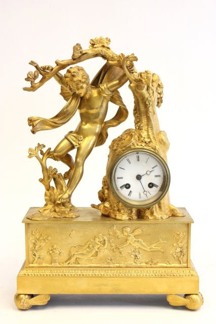 19th c. dore bronze figural clock "Man in Tree": Approx. 18" x 11".Please read our terms of sale.