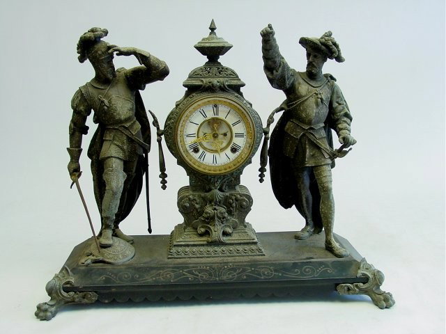 Ansonia double figural mantel clock: With open escapement, finger missing, metal pitted. Approx. 21.5" x 24". From L.I. estates. Please read our terms of sale.