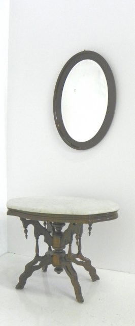 Marble top Victorian coffee table & oval mirror: Approx. 32" x 21" x 22" H. From an Americana Short Hills, NJ estate. Please read our terms of sale.