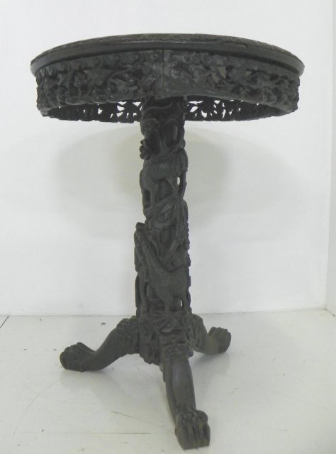 19th c. marble top teakwood table: Carved base & apron. Repairs to apron. Approx. 24.5" D x 35" H. Please read our terms of sale.