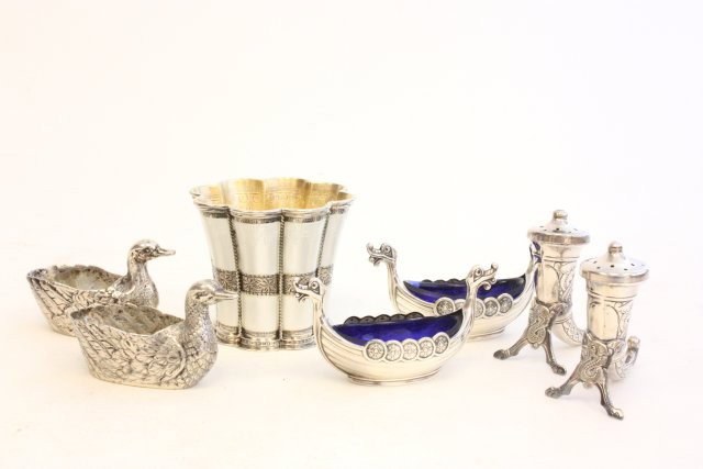 Group lot of sterling silver: Including: 1- Danish enameled toothpick holder, approx. 2 1/3". 1- Pair "800" silver "Swan" salters. 1- Pair Norway "Horn of Plenty" salt & pepper. 1- Pair 925 Norway "Boats" salters, with blue insert
