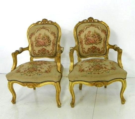 Pair French aubusson style arm chairs: With pink flowers, depicting "Romeo & Juliet", machine made. Approx. 33" H x 23.5" L x 19" W. Please read our terms of sale.