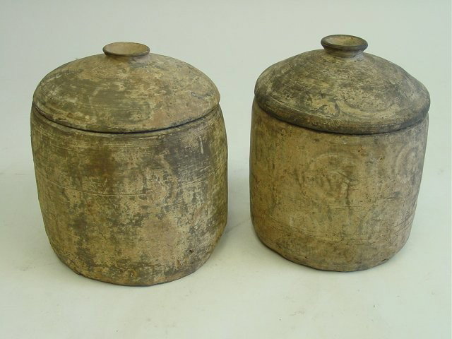 Pair Chinese pottery jars with covers Han Dynasty: 206BC - 200AD. Approx. 8.5" H. From Arthur M Sackler Collection. Please read our terms of sale.