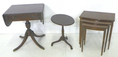 3 mahogany tables: Including: 1- Nesting set of 3 tables, approx. 22" x 22" x 15" D. ca 1940. 1- Drop leaf oval table, approx. 21" x 15" x 19", ca. 1960's. 1- Duncan Phyfe style mahogany drop leaf table, approx. 28" x 3