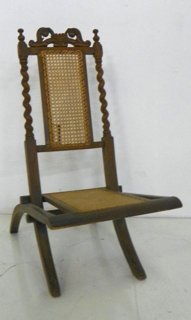Folding opera or campaign chair: Barley twist, caned seat. Approx. 34" x 16". Please read our terms of sale.