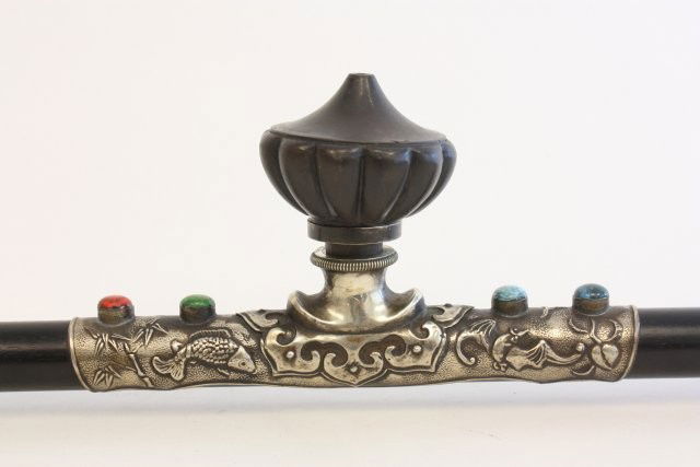 Ebony, jade & silvered bronze opium pipe: Approx. 21.25" L. Please read our terms of sale.