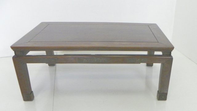 Chinese carved rosewood coffee table: Possibly Huanghuali (top). Approx. 36" x 24" x 14". Please read our terms of sale.