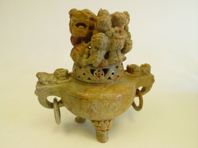 Soapstone incense burner with "Foo Dog": From a private N.Y.C. collector. Approx. 8.25" x 7.5". Please read our terms of sale.