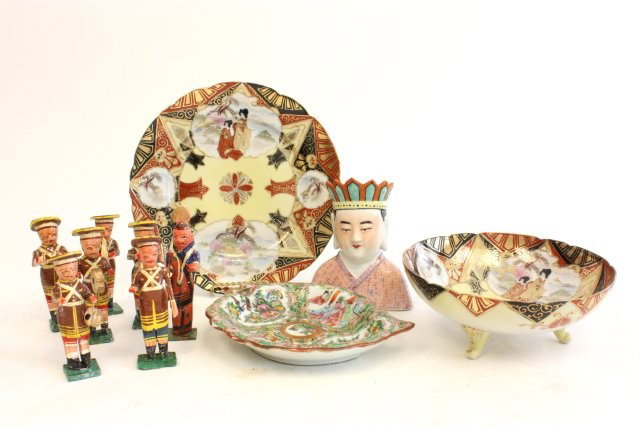 Group lot of assorted smalls: 1- Rose Medallion "Leaf" plate, approx. 7.5" x 6. 1- Chinese porcelain bust of a "Prince", approx. 5" H. 1- Japanese decorated bowl & under plate, approx. 4" H x 7" D. 1- Group of 7 carved wood musici