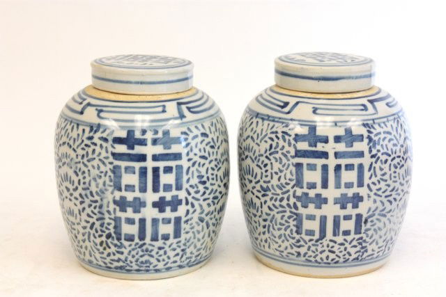 Pair covered ginger jars: Blue & white with patterns. Approx. 9.25" H x 6" Diam. Please read our terms of sale.