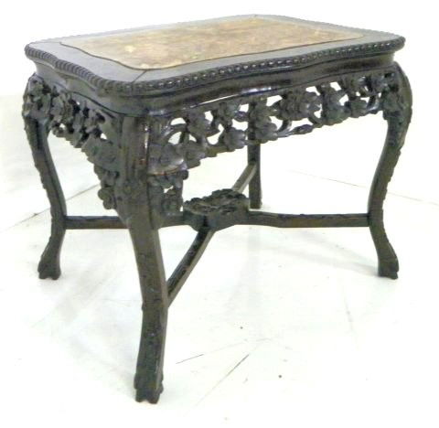 Chinese marble top teakwood coffee table: Rectangular, floral carved legs & apron. Approx. 17" x 22" x 19". Please read our terms of sale.