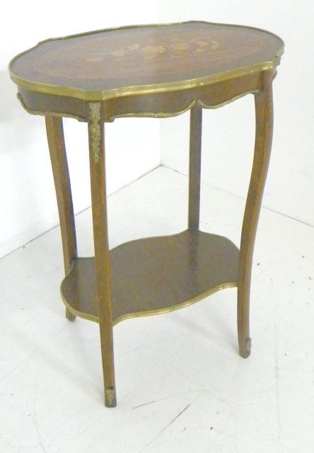 Louis XV oval marquetry bronze mounted table: Approx. 21" x 13" x 28" H. Please read our terms of sale.