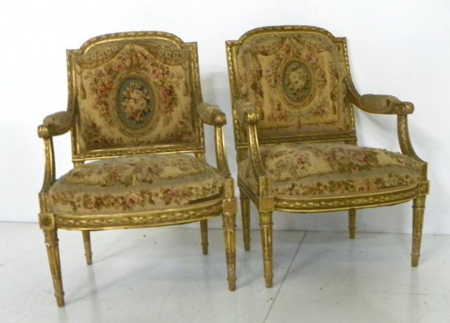 Pair 18th c. Aubusson upholstered open arm chairs: Gilt. Frame is 19th c. Worn condition. Please read our terms of sale.