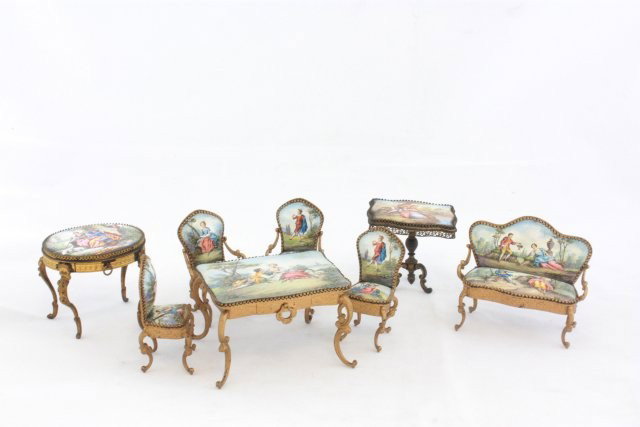 8 Austrian enamel miniature furniture pieces: Table approx. 2" x 3", 4 chairs, loveseat, rectangular & round end tables, marked Austria, 19th/20th c. in a Faberge black lacquer presentation box, approx. 10" x 10". From a Greenwich, CT estate. Ple