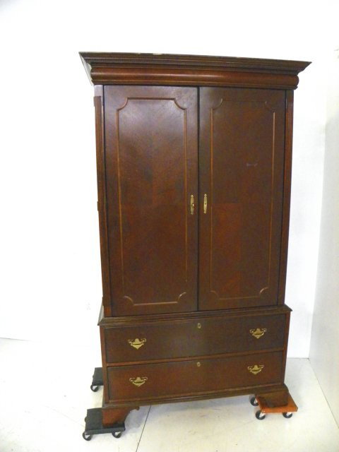 Hepplewhite style mahogany linen press/tv cabinet: 20th c. Approx. 6' 9" H x 3' 9" W x 25" D. Please read our terms of sale.
