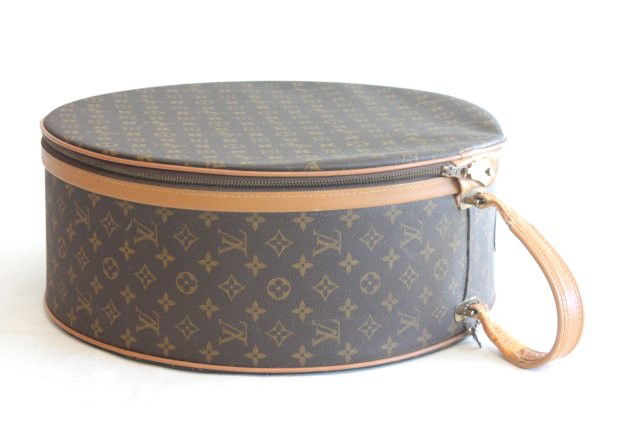 Louis Vuitton hat box: With Saks Fifth Av. labels, handle needs replacing, otherwise mint condition. Please read our terms of sale.