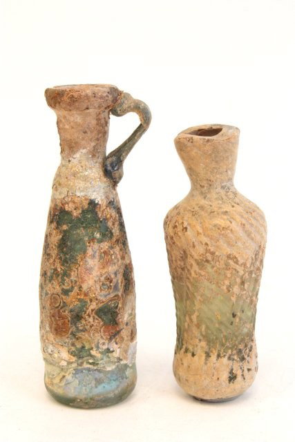 2 Roman glass bottles: Please read our terms of sale.