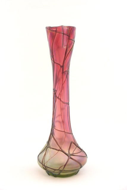 Loetz art glass vase: Threaded glass, unsigned, ca. 1900. Approx. 8.5" H. Please read our terms of sale.
