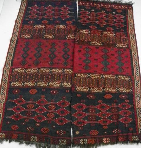 Pair semi-antique hanging Afghan rugs: Approx. 85" H x 35" W Please read our terms of sale.