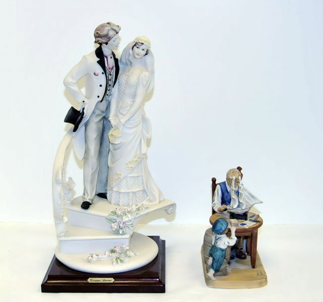 "Armani" & Norman Rockwell figures: 1- Armani "Bride & Groom, approx. 12.5" H. 1- Norman Rockwell figure "For a Good Boy", approx. 5.5" H x 5.24" W. Please read our terms of sale.