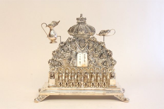 Mid 20th c. European sterling silver oil menorah: Stamped 925 sterling. Approx. 12.75" H x 14.25" W x 15.5" D. Please read our terms of sale.
