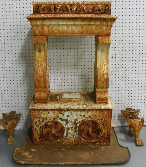 Mid 19th c. Empire cast iron stove: Approx. 42.5" H x 21" across x 10.75" D. Please read our terms of sale.