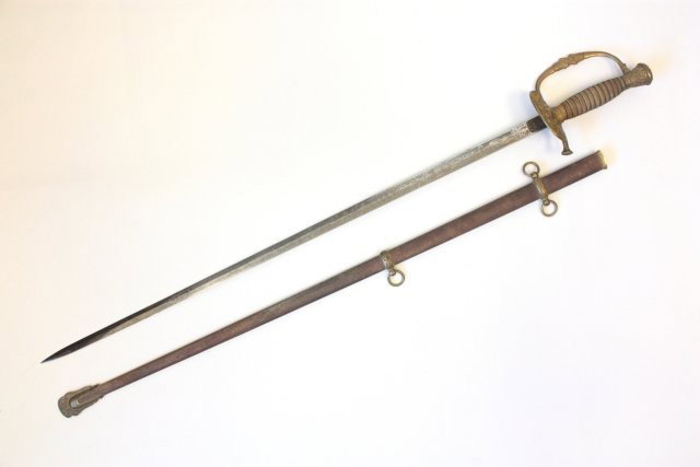Grand Army of the Republic sword: C.W. Simmons, Boston, brass hilt, blade 28" embossed with Abraham Lincoln, scabbard had brass fittings. Approx. 36" overall. From a Long Island estate collection. Please read our terms of sale.