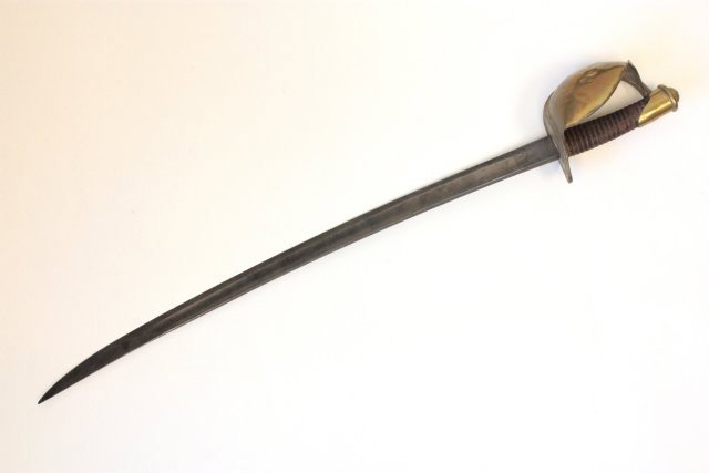 Ames Civil War cutlass: Brass & leather hilt, blade 26", marked Ames Mfg Co., Chicopee, Mass., dated 1861. Approx. 32" overall. From a Long Island estate collection. Please read our terms of sale.