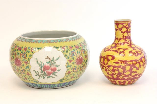 Lot of 2 Chinese porcelains: 1- Large jar with yellow background, "Peach" motif with mark. 1- Red vase with yellow "Flowers & Dragon", with mark. Largest approx. 9.5" H x 6.75" Diam. Please read our terms of sale.
