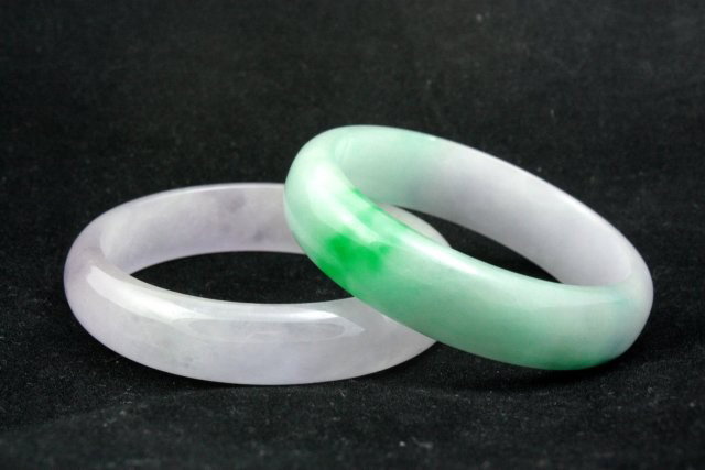 2 green/lavender jade bangle bracelets: Approx. 2.25" interior diameter. Please read our terms of sale.