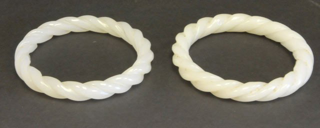 Pair white jade bangles: Approx. 2.75" opening. Please read our terms of sale.
