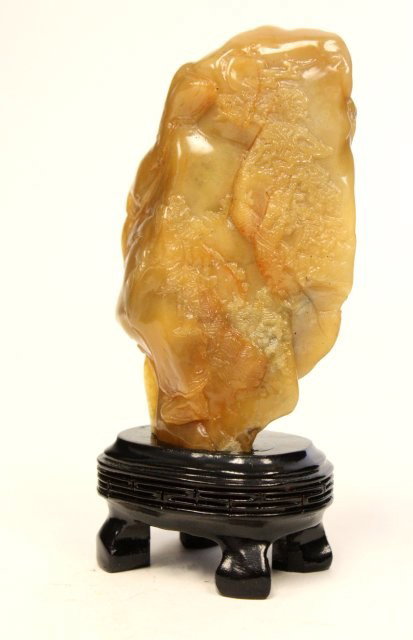 Exceptional Tianhuang scholar soapstone: With stand. Approx. 4.5" H x 2.5" L. From a collection of a Los Angeles, California professor, acquired in Singapore in the 1950's. Please read our terms of sale.