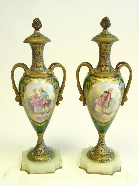 Pair 19th c. Sevres bronze mounted vases: With champleve decoration, on onyx bases, signed G. Clerget. Approx. 13.5" H with base. Please read our terms of sale.