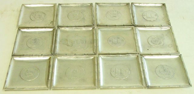 Set of 12 Chinese silver square coasters: Each with a different Chinese coin embedded in center, Republic period (early - mid century), maker's stamp on edge. Approx. 3.5" square, 33 oz. From a prominent Philadelphia collection spanning 60 ye