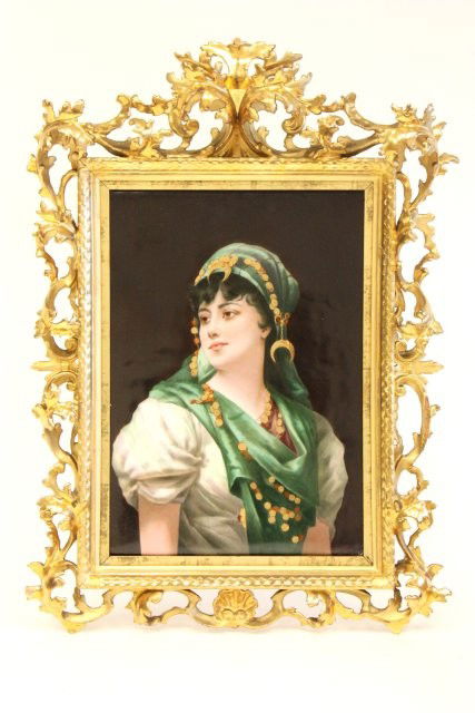 KPM porcelain plaque "Gypsy Woman": 19th c., Hand painted. fabulously carved gilt frame, incised KPM mark en verso. Plaque approx. 13.5" x 9", framed 21" x 14". Please read our terms of sale.