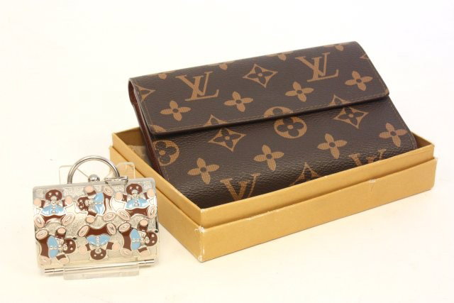 Louis Vuitton purse in original box & metal purse: Metal enameled purse depicting "Teddy Bears", Judith Leiber by Neiman Marcus. Please read our terms of sale.