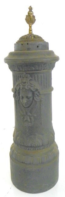 Victorian figural round stove: Approx. 31" H x 10" Diam. Please read our terms of sale.