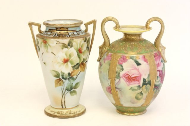 2 Early 20th c. handpainted Nippon vases: Floral, handled. Approx. 8.5" & 9.5". From a Brooklyn estate. Please read our terms of sale.