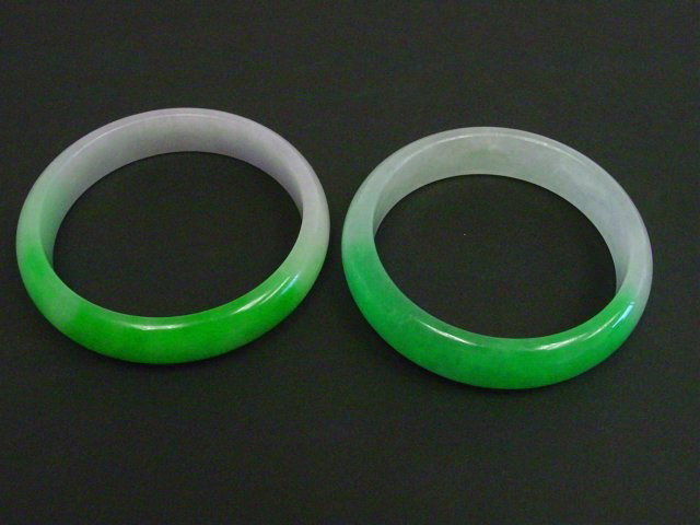 Pair jade bangles: Approx. 2.5" Diam. Please read our terms of sale.
