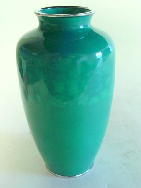 Japanese wireless cloisonne vase: Green enamel with a band of "Leafy Peony, probably Ando (unmarked). Approx. 9.5" H. Please read our terms of sale.