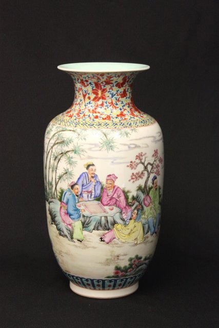 Famille Rose porcelain vase with Qing mark: Depicting "Men Playing a Game". Approx. 15.5" H. Please read our terms of sale.