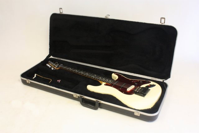 Fender custom made 6 string electric guitar: With Fender case. Approx. 38".