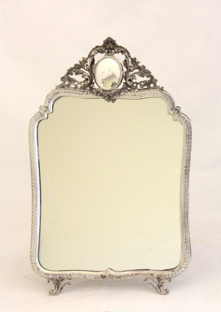 Sterling silver table mirror: Approx. 16"H X 9.5"W.
