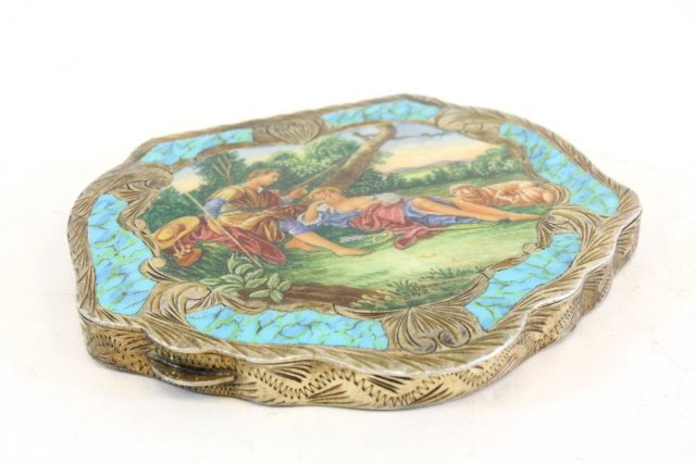 Enamel silver compact: Approx. 3.25" x 2.75".