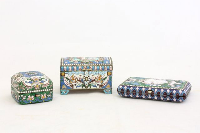 Group of 3 silver & enamelled boxes: 1-2.5" x 4" cigarette case. 1-2" x 2" x 1.5" pill box. 1-3" x 2" x 2" trunk. All stamped N.C. 84 & gilt vermeil interior