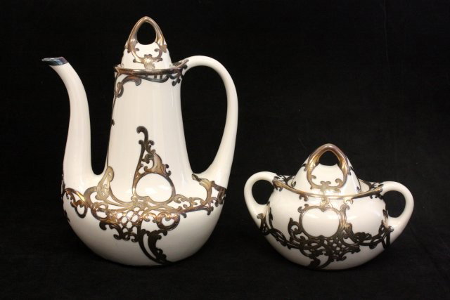 Porcelain coffee pot & sugar bowl: With silver overlay