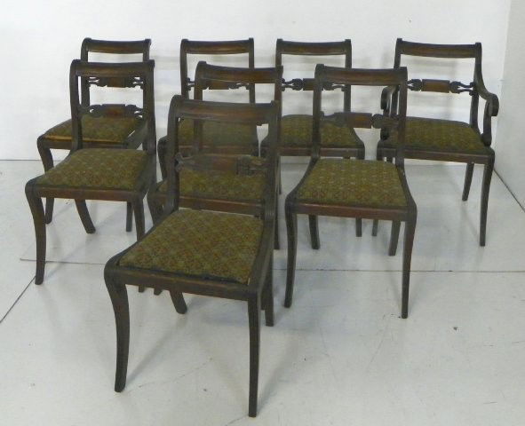 Set of 8 mahogany chairs with needlepoint seats: Duncan Phyfe style.