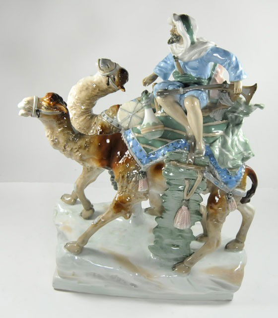 Amphora figure of "Arab with Camels" signed: Reins missing, signed on bottom. Approx. 13" W x 15.5" H.