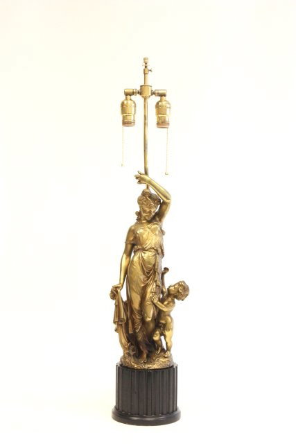 19th c figural sculpture signed Trodoux: Dore bronze, depicting classical woman and child . Mounted as a lamp on a wood base. Figure approx. 18" H x 7.25" W, base approx. 5" H.