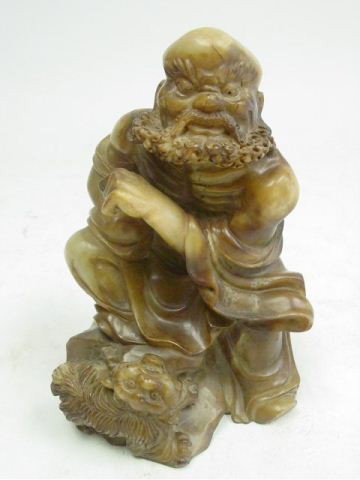 19th c. soapstone figure "Shualo with Dog": Approx. 9" H.